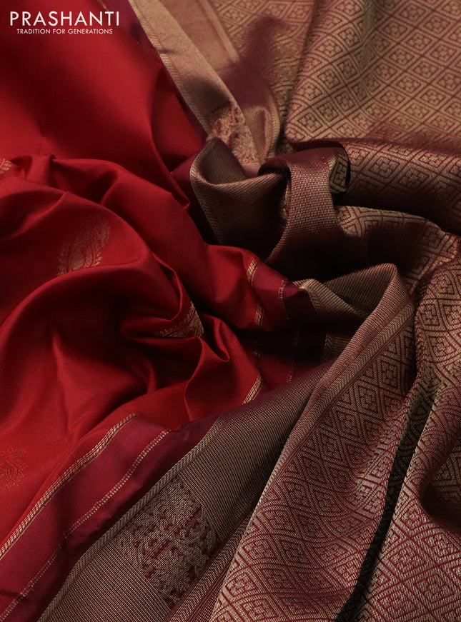 Pure kanchipuram silk saree maroon and deep maroon with paisley zari woven buttas and rich zari woven border