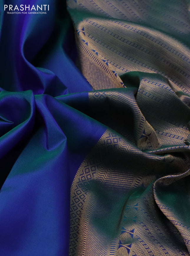 Pure kanchipuram silk saree dual shade of bluish green with plain body and temple zari woven border