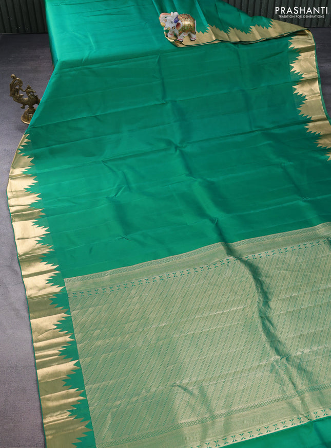 Pure kanchipuram silk saree green with plain body and temple zari woven border