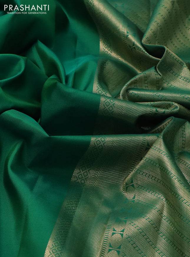 Pure kanchipuram silk saree green with plain body and temple zari woven border