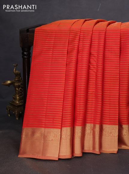 Pure kanchipuram silk saree dual shade of orange and dual shade of sandal with allover zari stripe pattern and rich zari woven border