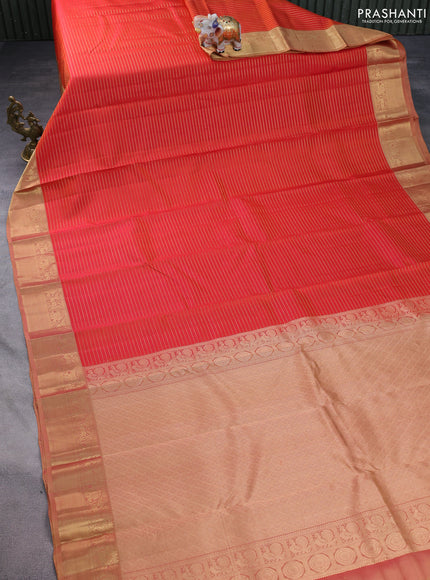 Pure kanchipuram silk saree dual shade of orange and dual shade of sandal with allover zari stripe pattern and rich zari woven border