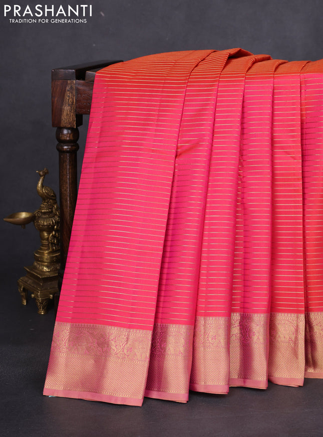 Pure kanchipuram silk saree dual shade of pinkish orange and sandal with allover zari stripe weaves and rich zari woven border