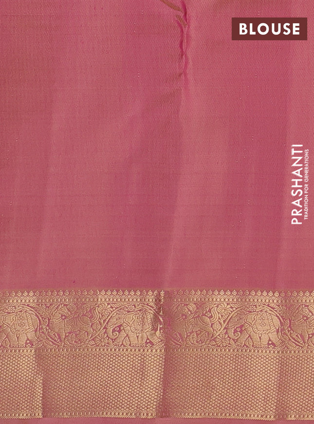 Pure kanchipuram silk saree dual shade of pinkish orange and sandal with allover zari stripe weaves and rich zari woven border
