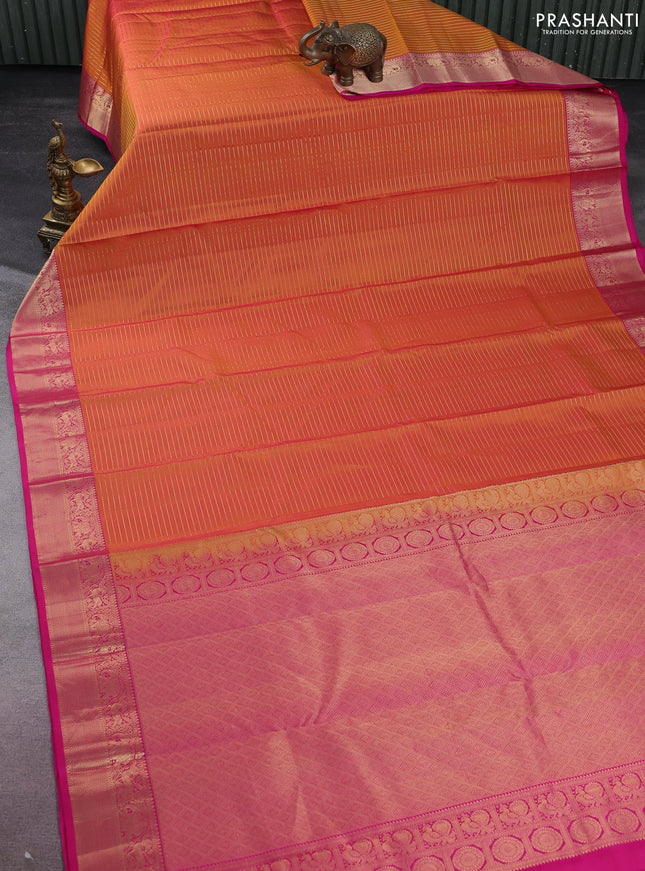 Pure kanchipuram silk saree dual shade of mustard yellow and pink with allover zari stripe weaves and rich zari woven border