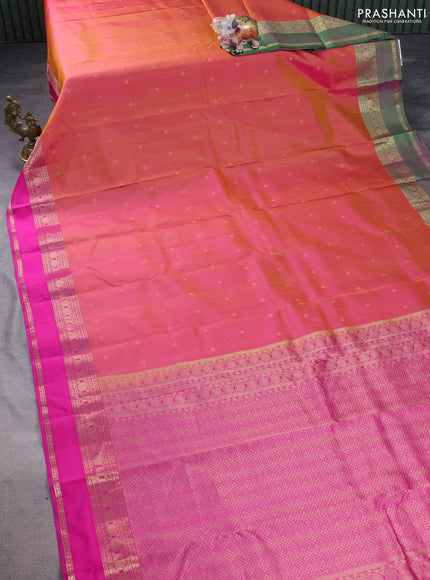 Pure kanchipuram silk saree dual shade of pinkish orange and pink with allover zari woven buttas and ganga jamun border