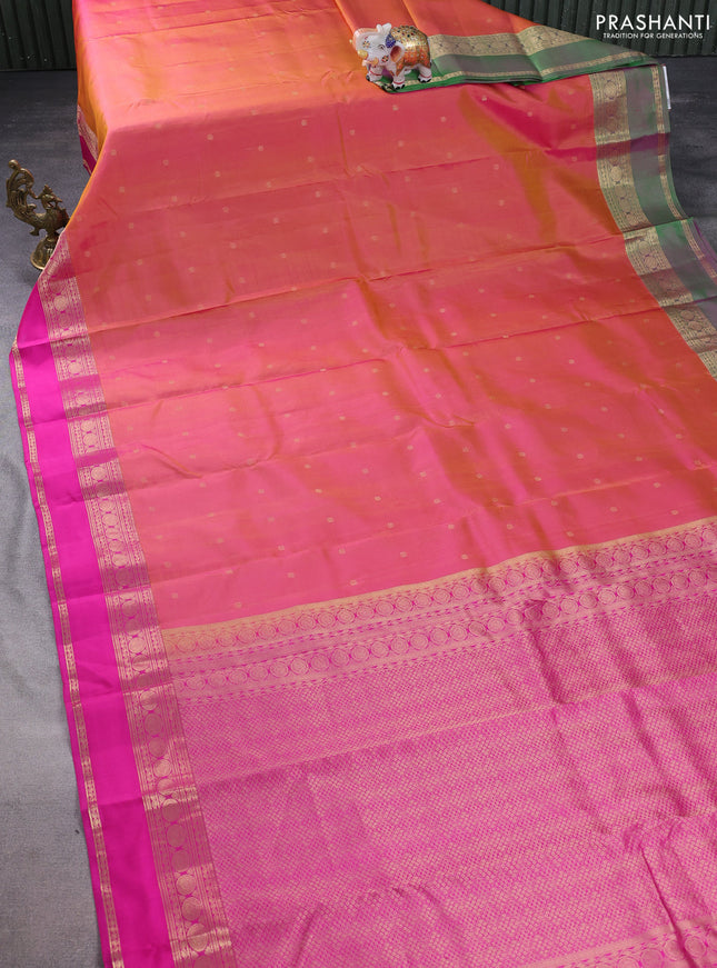 Pure kanchipuram silk saree dual shade of pinkish orange and pink with allover zari woven buttas and ganga jamun border