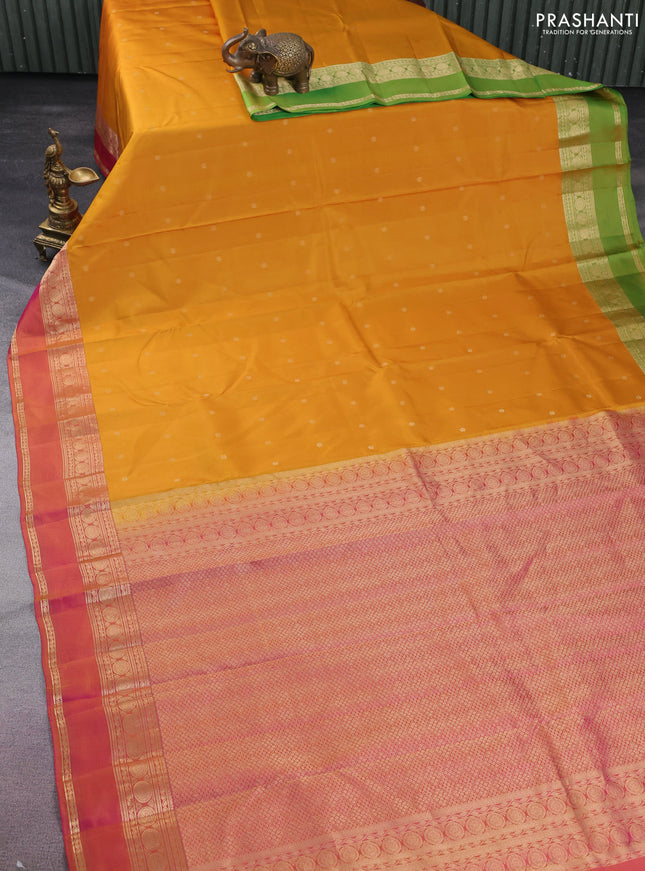Pure kanchipuram silk saree mustard yellow with allover zari woven buttas and ganga jamun border