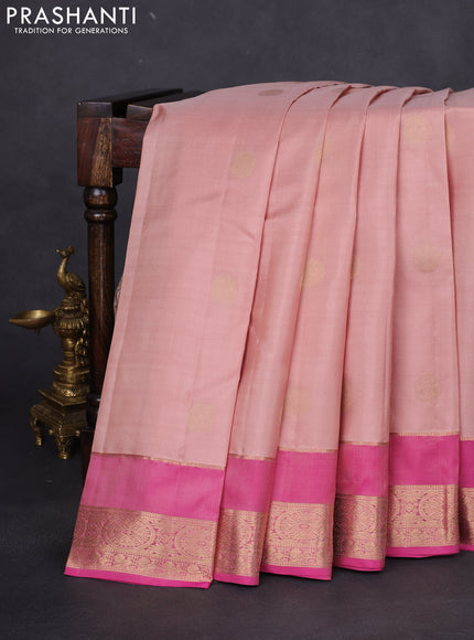 Pure kanchipuram silk saree pastel peach shade and pink with zari woven buttas and rettapet zari woven border