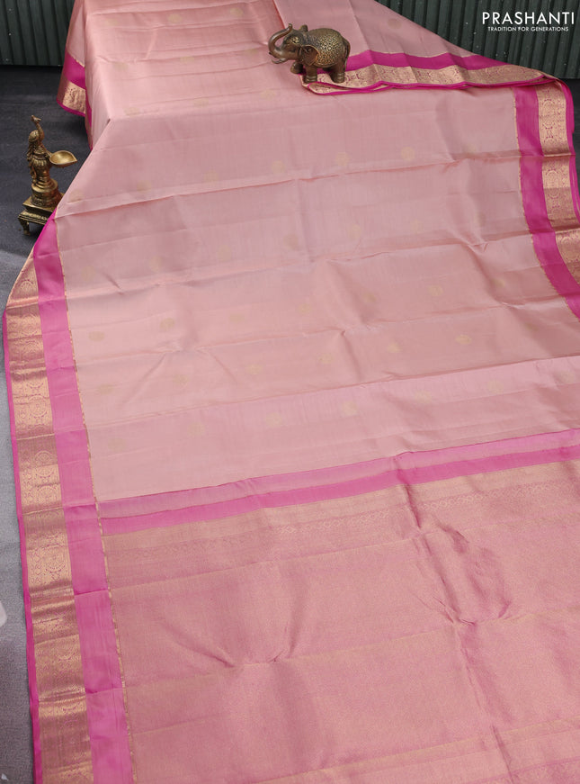 Pure kanchipuram silk saree pastel peach shade and pink with zari woven buttas and rettapet zari woven border