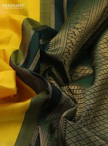 Pure kanchipuram silk saree yellow and bottle green with zari woven buttas and rich zari woven korvai border