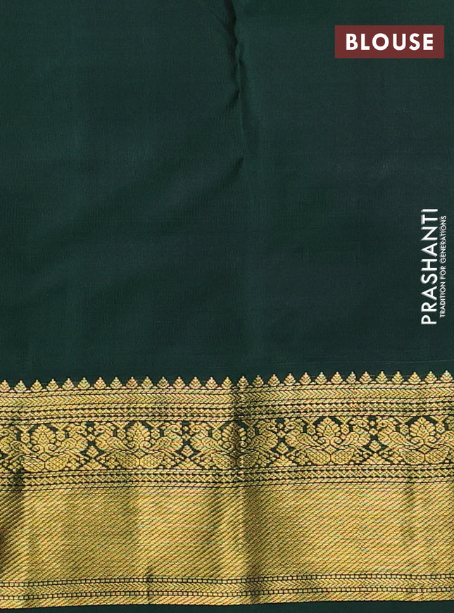 Pure kanchipuram silk saree yellow and bottle green with zari woven buttas and rich zari woven korvai border