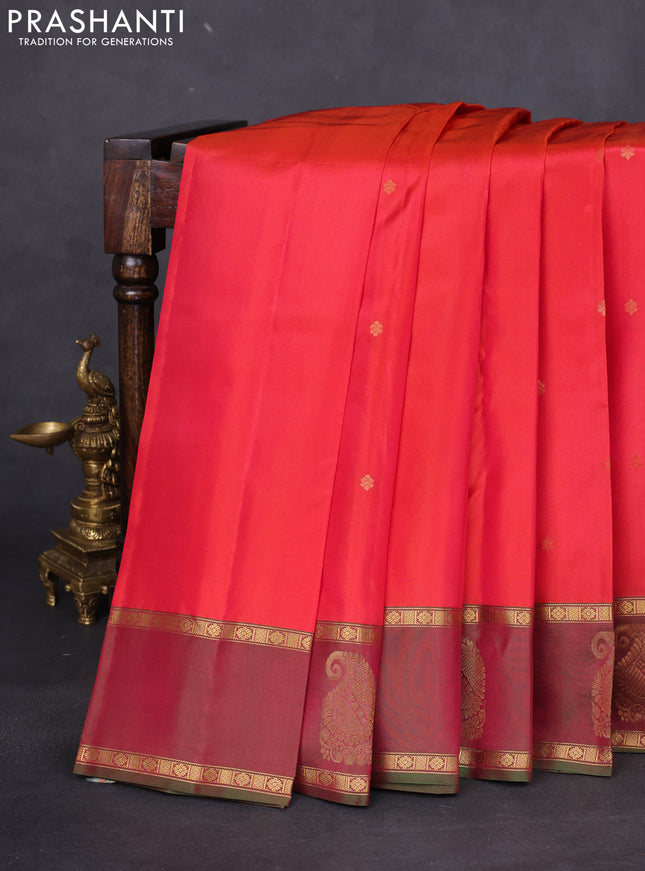Pure kanchipuram silk saree dual shade of orange and dual shade of green with zari woven buttas and zari woven paisley butta border