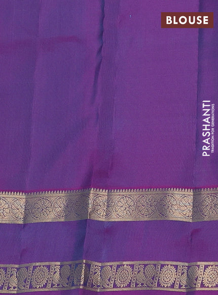 Pure kanchipuram silk saree royal blue and purple with allover zari woven buttas and rettapet zari woven border