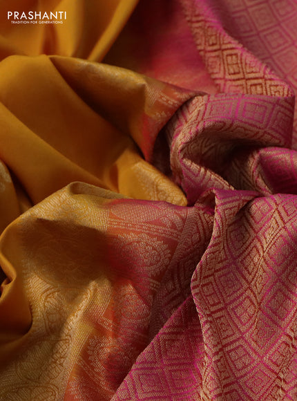 Pure kanchipuram silk saree mustard yellow and pink with allover zari woven buttas and rettapet zari woven border