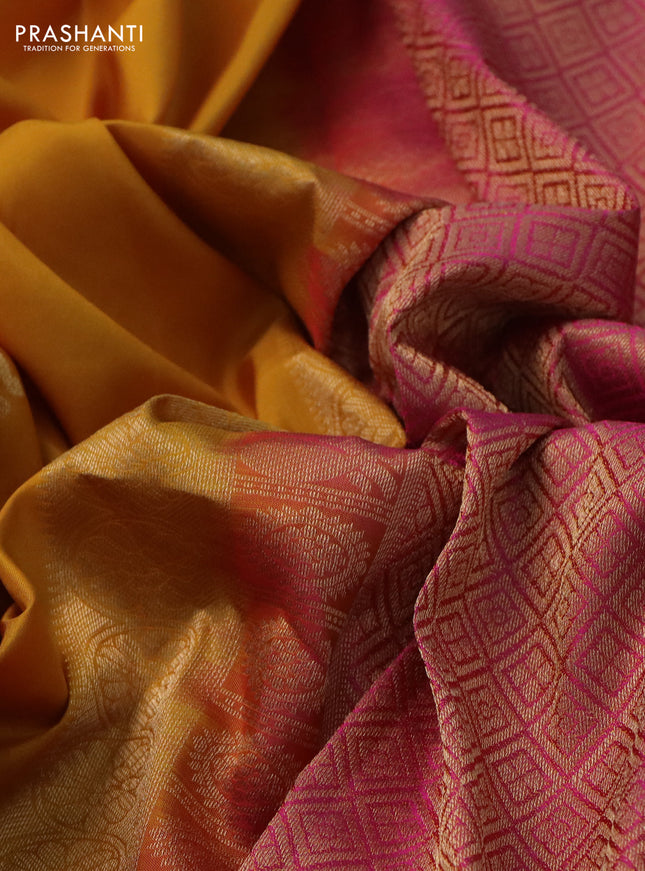Pure kanchipuram silk saree mustard yellow and pink with allover zari woven buttas and rettapet zari woven border