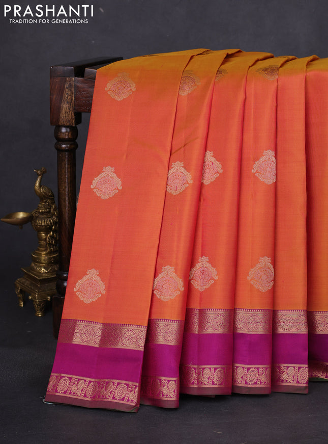Pure kanchipuram silk saree dual shade of dark mustard and purple with zari woven buttas and rettapet zari woven border
