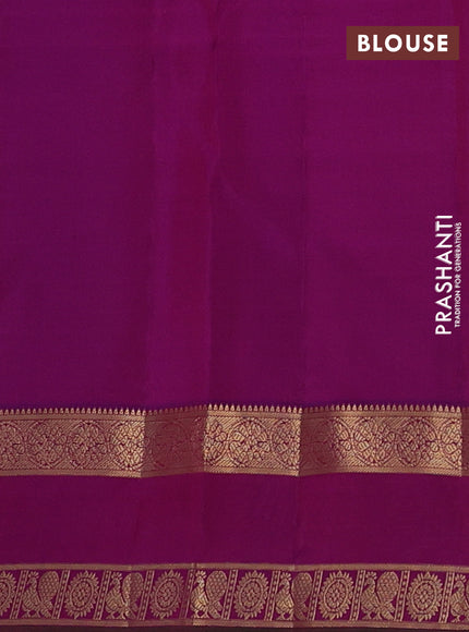 Pure kanchipuram silk saree dual shade of dark mustard and purple with zari woven buttas and rettapet zari woven border