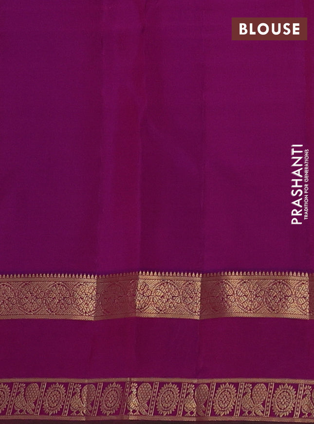 Pure kanchipuram silk saree dual shade of dark mustard and purple with zari woven buttas and rettapet zari woven border