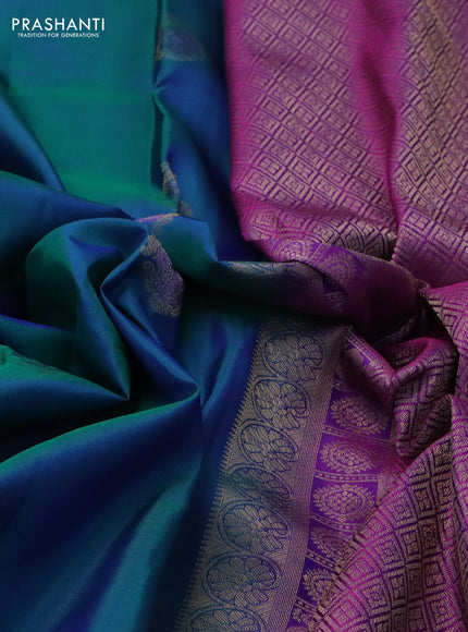 Pure kanchipuram silk saree dual shade of teal greenish blue and purple with zari woven buttas and rettapet zari woven border