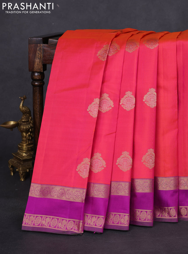 Pure kanchipuram silk saree dual shade of pinkish orange and purple with zari woven buttas and rettapet zari woven border