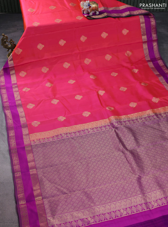 Pure kanchipuram silk saree dual shade of pinkish orange and purple with zari woven buttas and rettapet zari woven border