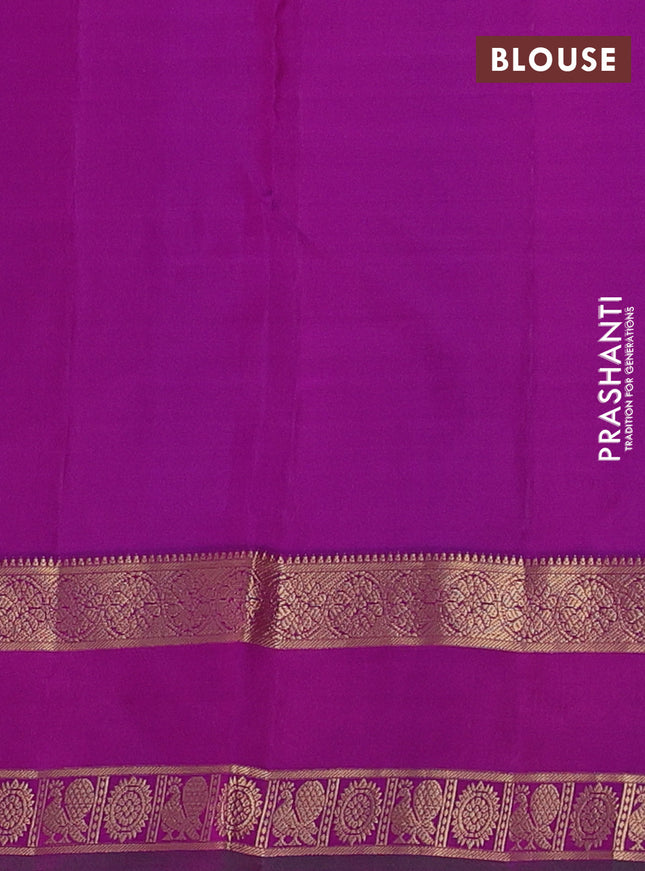 Pure kanchipuram silk saree dual shade of pinkish orange and purple with zari woven buttas and rettapet zari woven border