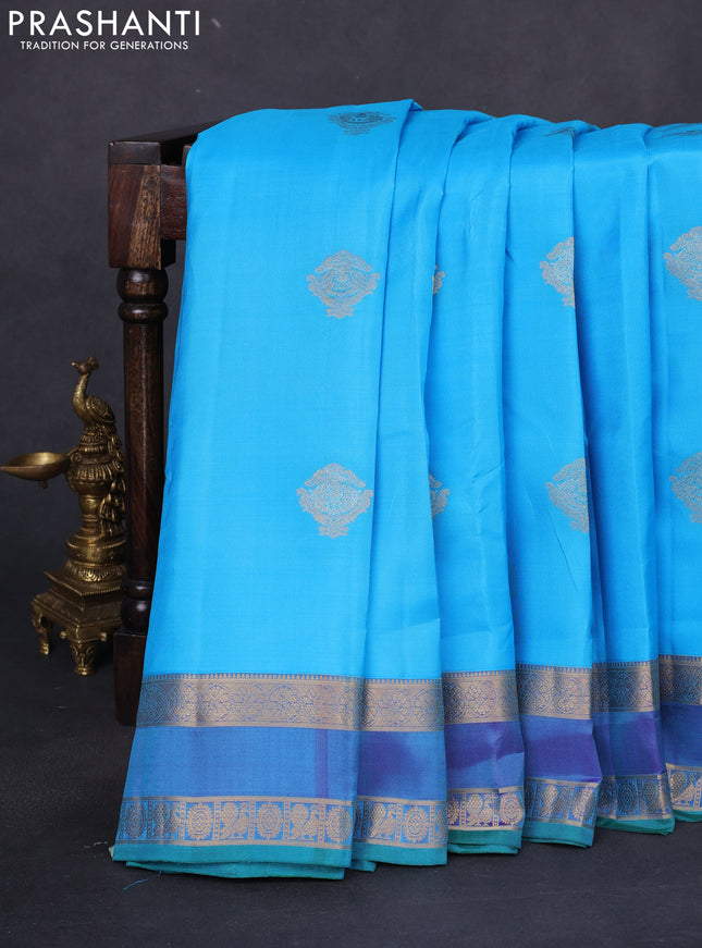 Pure kanchipuram silk saree light blue and dual shade of purple with zari woven buttas and rettapet zari woven border