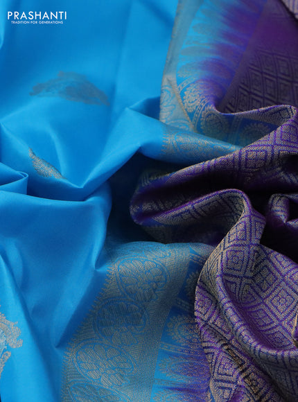 Pure kanchipuram silk saree light blue and dual shade of purple with zari woven buttas and rettapet zari woven border