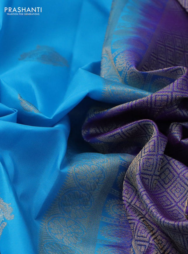 Pure kanchipuram silk saree light blue and dual shade of purple with zari woven buttas and rettapet zari woven border