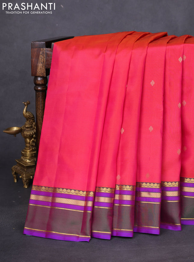 Pure kanchipuram silk saree dual shade of pinkish orange and green with zari woven buttas and rettapet zari woven border