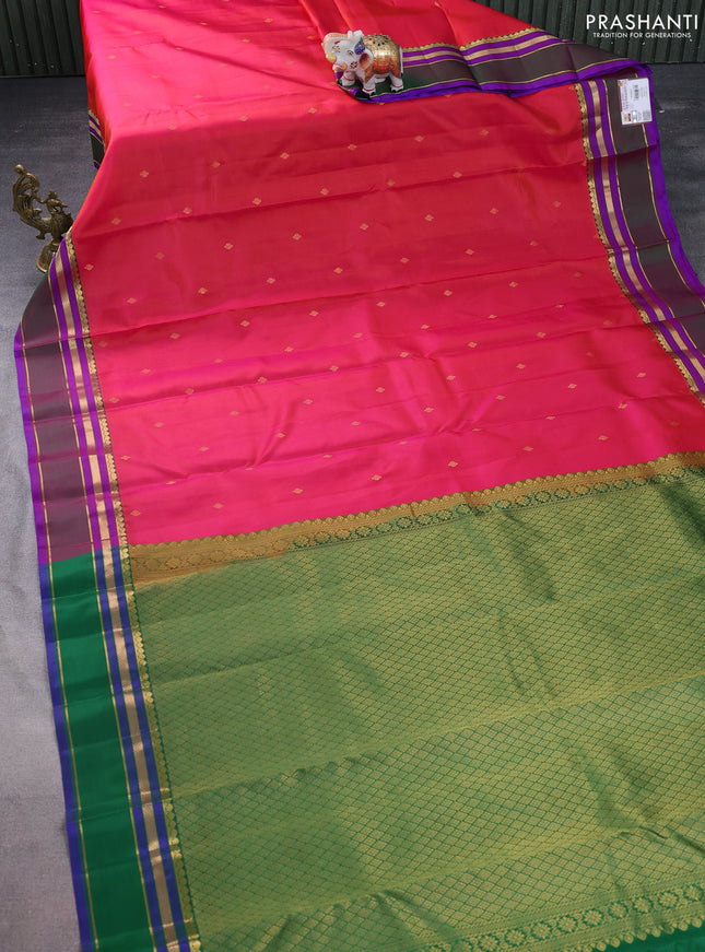 Pure kanchipuram silk saree dual shade of pinkish orange and green with zari woven buttas and rettapet zari woven border