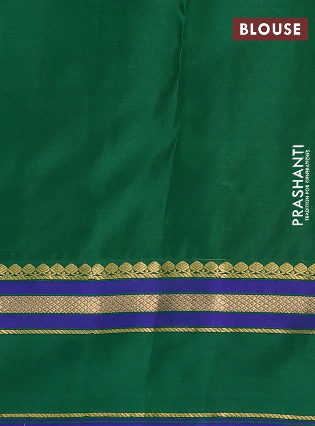 Pure kanchipuram silk saree dual shade of pinkish orange and green with zari woven buttas and rettapet zari woven border