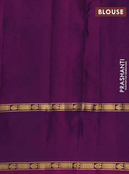 Pure kanchipuram silk saree dual shade of peacock green and purple with zari woven paisley buttas and zari woven butta border