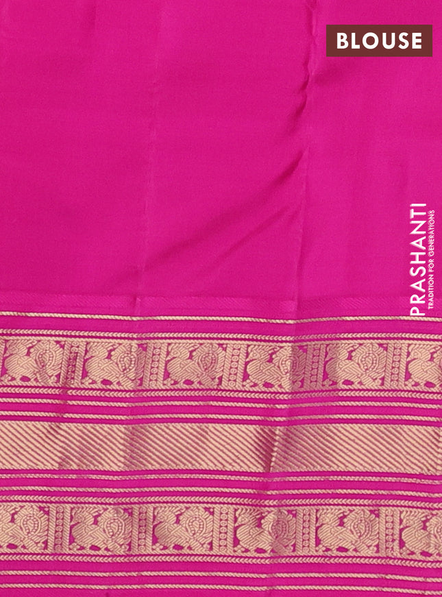 Pure kanchipuram silk saree dual shade of pinkish orange and pink with zari woven annam buttas and rich zari woven border