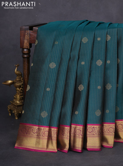Pure kanchipuram silk saree peacock green and dark magenta pink with allover zari weaves & buttas and rich zari woven border