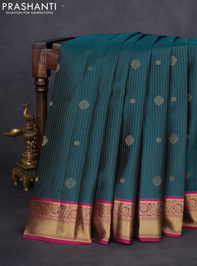 Pure kanchipuram silk saree peacock green and dark magenta pink with allover zari weaves & buttas and rich zari woven border