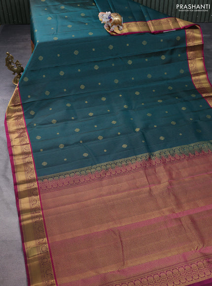 Pure kanchipuram silk saree peacock green and dark magenta pink with allover zari weaves & buttas and rich zari woven border