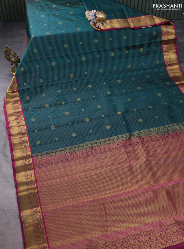 Pure kanchipuram silk saree peacock green and dark magenta pink with allover zari weaves & buttas and rich zari woven border