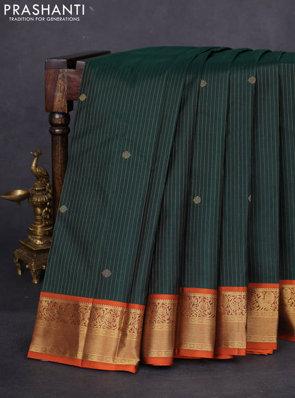 Pure kanchipuram silk saree bottle green and orange with allover zari weaves & buttas and rich zari woven border
