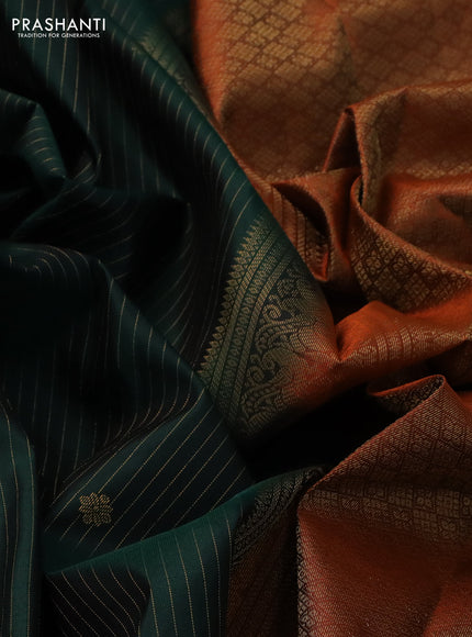 Pure kanchipuram silk saree bottle green and orange with allover zari weaves & buttas and rich zari woven border