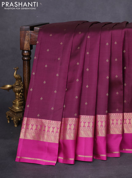 Pure kanchipuram silk saree wine shade and purple with allover zari woven buttas and rettapet zari woven border