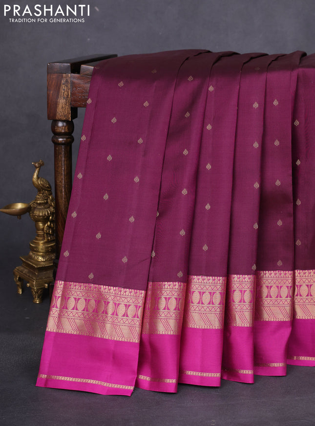 Pure kanchipuram silk saree wine shade and purple with allover zari woven buttas and rettapet zari woven border