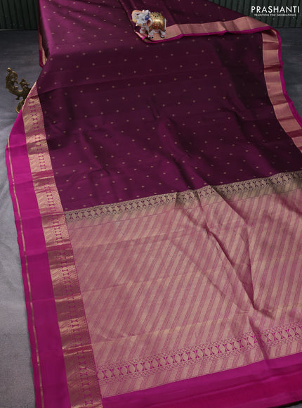 Pure kanchipuram silk saree wine shade and purple with allover zari woven buttas and rettapet zari woven border