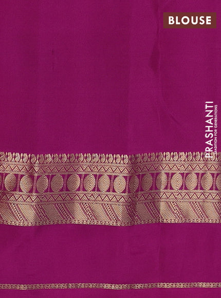 Pure kanchipuram silk saree wine shade and purple with allover zari woven buttas and rettapet zari woven border