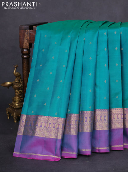Pure kanchipuram silk saree teal green and purple with allover zari woven buttas and rettapet zari woven border