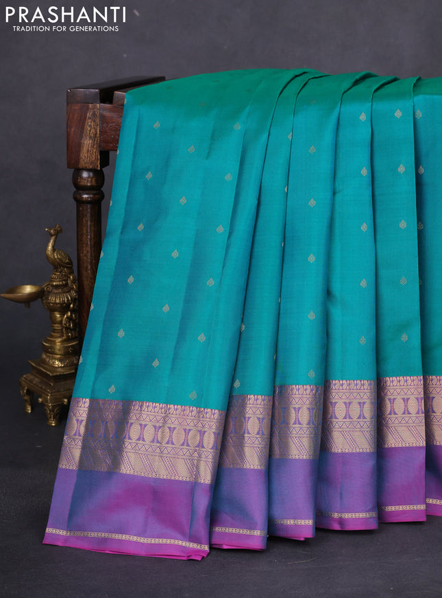 Pure kanchipuram silk saree teal green and purple with allover zari woven buttas and rettapet zari woven border