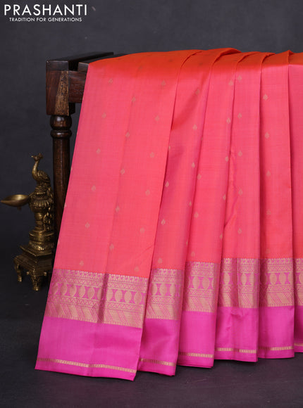 Pure kanchipuram silk saree dual shade of peach shade and pink with allover zari woven buttas and rettapet zari woven border