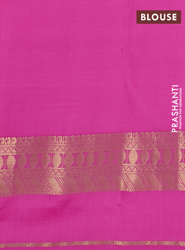 Pure kanchipuram silk saree dual shade of peach shade and pink with allover zari woven buttas and rettapet zari woven border