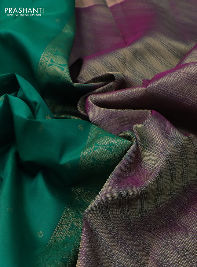 Pure kanchipuram silk saree green and dual shade of purple with allover zari woven buttas and rettapet zari woven border